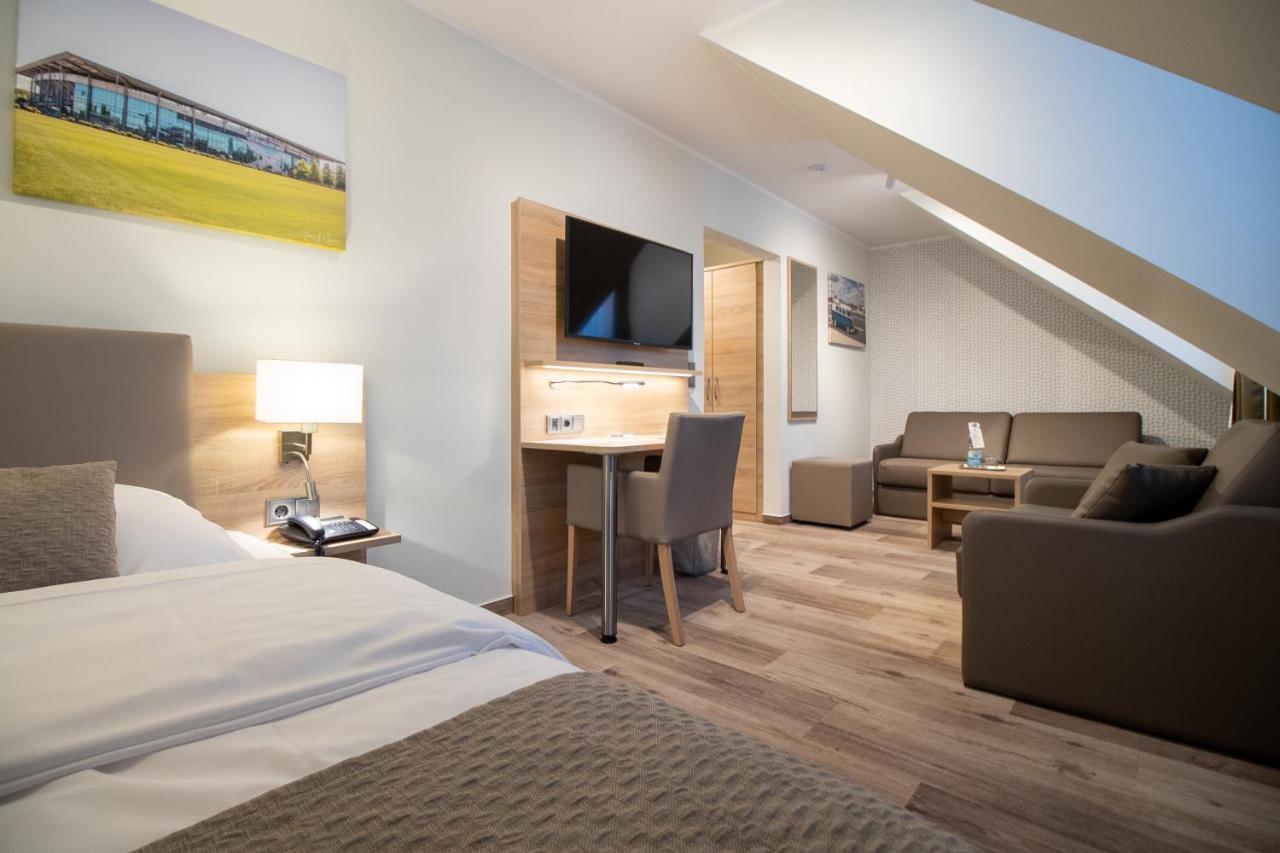 Hotel Fallersleber Spieker วอล์ฟสบวร์ก ภายนอก รูปภาพ