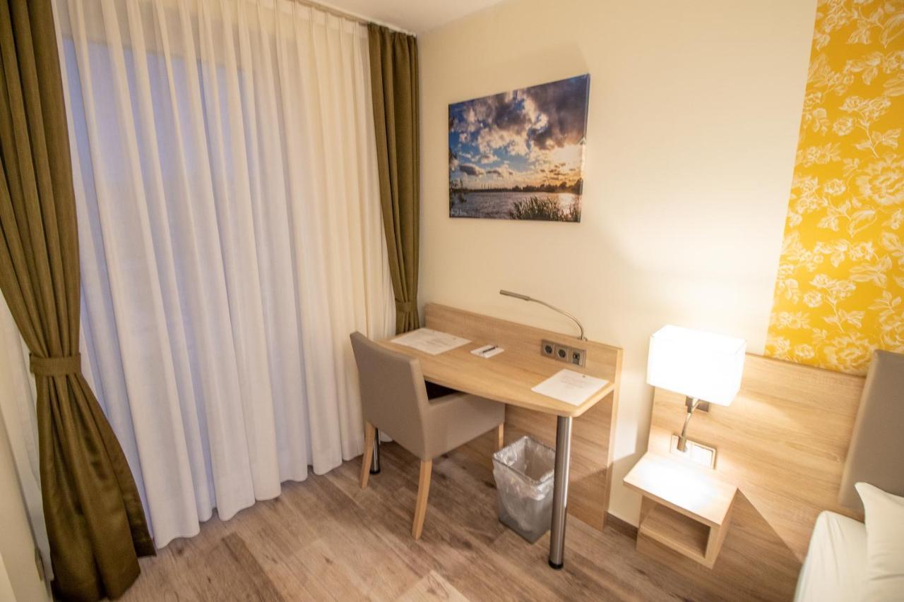 Hotel Fallersleber Spieker วอล์ฟสบวร์ก ภายนอก รูปภาพ