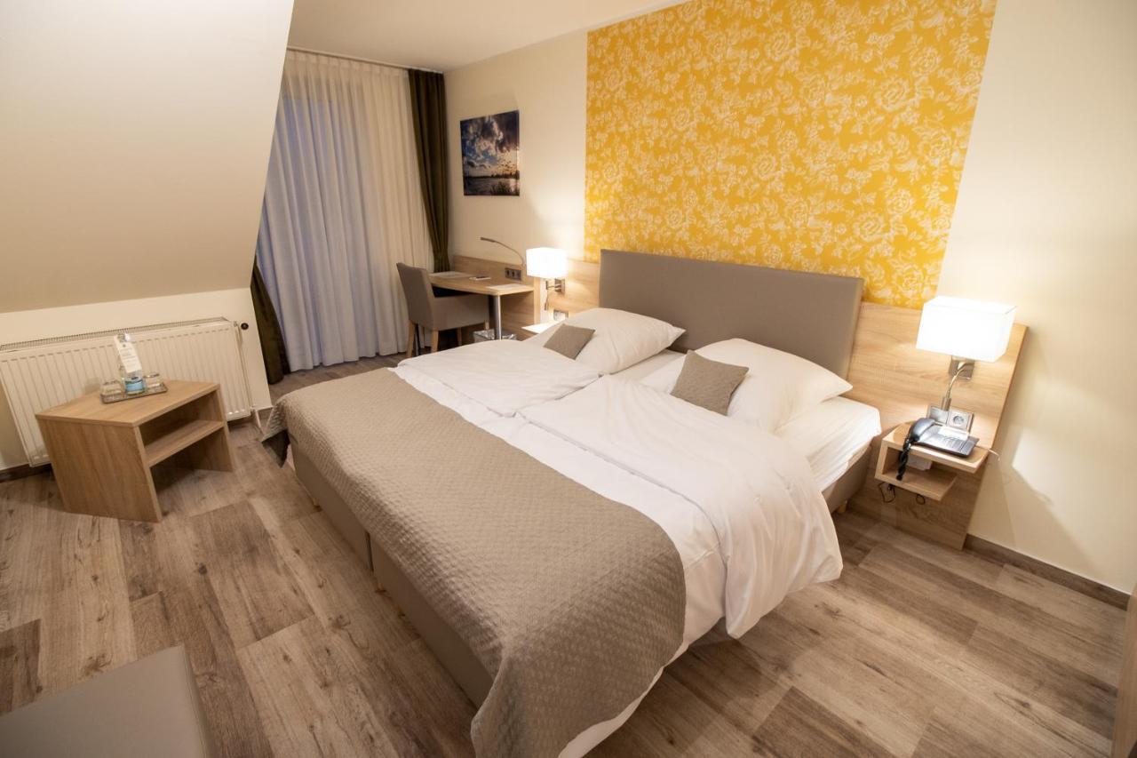 Hotel Fallersleber Spieker วอล์ฟสบวร์ก ภายนอก รูปภาพ